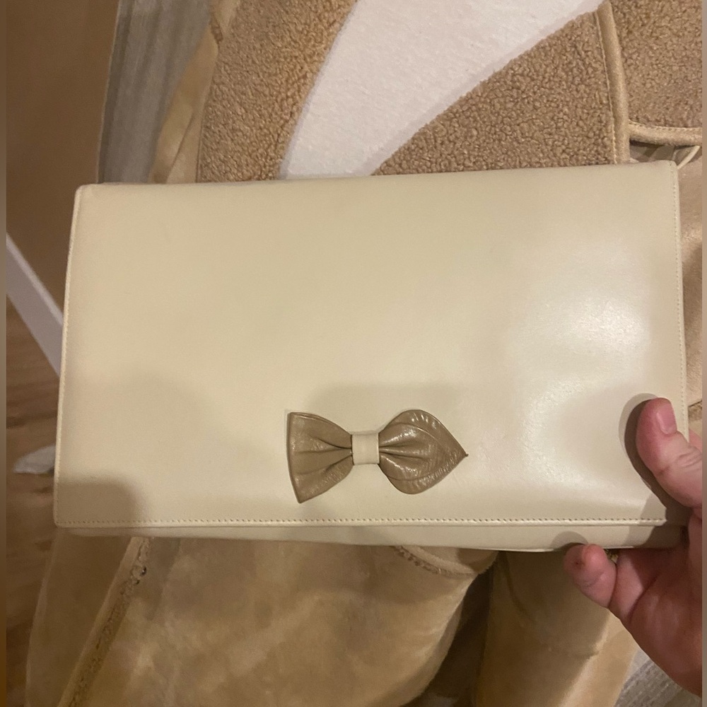 Elegant Vintage Cream Clutch with Leather Bow Accent